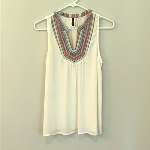 White sleeveless embroidered top